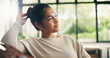© OnPoint/peopleimages.com - Couch, thinking and woman in home with smile for inspiration, break or resting in lounge. Daydreaming, calm and mature person in living room for reflection, relax and contemplating on sofa in house