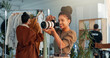 © WesJVR/peopleimages.com - Woman, photographer or studio with camera crew, stylist or team for production or photoshoot. Female person, employee or smile with lens for creative agency, commercial business or marketing campaign