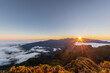 © Westend61 - Sunrise over foggy mountains at Miradouro da Bica da Cana, Madeira