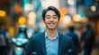 © Sunny - Asian man smiling in urban city bokeh street