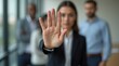 © Alex Pios - Stop, hand sign and woman in business suit with no gesture for sexual harassment and violence in office workplace
