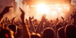 © fotofabrika - Crowd celebrates at music concert during evening event with bright lights