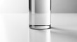 © nur - Clear glass of water on white surface with shadows minimalist still life