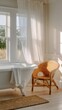 © Anna - A bright and airy bathroom features a clawfoot tub, a wicker chair, and sheer curtains letting in sunlight
