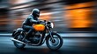 © NovaVision - Rider in leather jacket and helmet speeds down street on vintage orange motorcycle