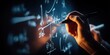© NovaVision - Close-up of a hand writing complex mathematical formulas on a dark blackboard
