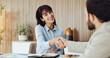 © DavidsPrime/peopleimages.com - Happy, business people and meeting with handshake for partnership, introduction or hiring in office. Businessman, woman or colleagues shaking hands with smile for b2b, agreement or job recruiting