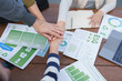 © crizzystudio - Business team hands stacking, working on esg strategy