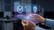 © Anusa - Digital approval process office environment interactive technology modern workspace closeup hands holding tablet secure transactions