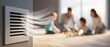 © Marta B - The air vent sending fresh airflow toward a family playing on the living room floor