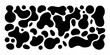 © Dayal - Abstract black and white pattern resembling cow spots on a white background