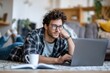 © Ольга Лукьяненко - Male adult attending online business meeting home