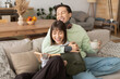 © Bliss - Joyful moments of love shared between a couple at home surrounded by comfort and happiness