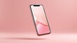 © Ksu_Sha - Modern smartphone mockup with floating design on soft pink background for mobile app or website display