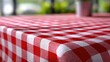 © Jyliia - The Tablecloth on a Red White Checkered Picnic Table with Soft Focus Background
