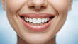 © janzwolinski - Close-up of a woman's perfect white smile with healthy teeth and lips