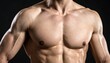 © munkar - Close-up of a Muscular Mans Torso Against a Dark Background.
