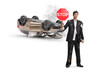 © Ljupco Smokovski - Man in a torn suit holding a stop sign next to an overturned car