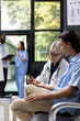 © DC Studio - Caucasian female doctor does blood sugar test with medical equipment as patient sits calmly. Routine glucose monitoring supports diagnosis, treatment planning and professional healthcare procedures.
