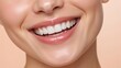 © Qazy - Close-up of a smiling mouth with white teeth and glossy lips