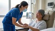 © Muchamad Musa - Caring nurse wearing a mask gently holds the hand of a patient receiving intravenous chemotherapy treatment in a hospital room.