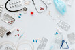 © Westend61 - Medical equipment and pills on white background with copy space