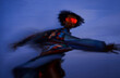 © VISTA by Westend61 - Man in motion with VR set under surreal light in cyberspace