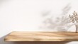 © Mateo - Warm Wooden Tabletop with Soft Natural Shadow Cast on a Clean White Wall, Minimalist Product Display Surface with Gentle Sunlight and Neutral Tones, Versatile Mockup Scene for Lifestyle Photography, E