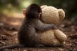 © Paola - Baby Macaque Seen from Behind Hugging Plush Toy – Orphan Monkey Expressing Attachment, Loneliness and Comfort Wildlife Concept