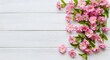 © Md - Pink flowers on white wooden background
