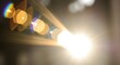 © mirajul - Blurry image of bright light and reflective surfaces