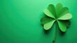 © rahwik - four leaf clover paper art flat lay top view on green background patricks day holiday composition concept of holiday decoration, greeting card design, seasonal marketing