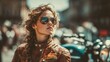 © zeitgenstd - Stylish young woman in leather jacket and sunglasses with a motorcycle