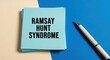 © The Little Hut - Medical Concept: Stack of Notes Displaying Ramsay Hunt Syndrome on a Blue and Beige Background