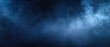 © LeNo - Sfondo astratto di fumo blu scuro e nebbia luminosa che si diffonde in un'atmosfera misteriosa e profonda.