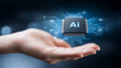 © kaliel - AI microchip floating above an open hand, symbolizing artificial intelligence power, computing innovation, and smart technology.