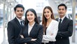 © Pegon - Confident Asian Business Team Ready for Success.