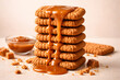 © greeny - Biscoff cookie stack visualizes indulgent caramel flavor through clean commercial studio photography