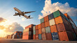 © Tanjin - Commercial airplane flying over colorful shipping containers at sunrise global trade logistics