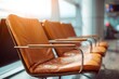 © jannik27s - casual leather chairs in the waiting area of an airport terminal