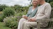 © olga_demina - Senior couple sitting on a wooden bench in their lush garden, holding warm mugs and engaging in a relaxed conversation, symbolizing companionship and easygoing retirement life