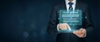 © lianlian liang - Businessman using transparent digital tablet with glowing license agreement text and icons for software legal compliance and intellectual property contract