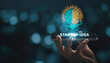 © Jihad - Innovative startup idea emerging on smartphone screen with glowing brain lightbulb