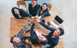© aFotostock - Top view of MultiEthnics Teamwork high five hands stack shakehand together. Collaboration Team Meeting in Conference Room. Diversity Partner Business Meeting brainstorm hand holding teamwork consult