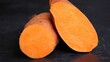 © PinkiePie - Sweet potato raw flesh, bright orange dense texture, starchy cut surface