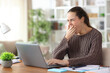 © Antonioguillem - Tired tele worker yawning working at home