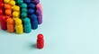 © irvan - Single red wooden pawn figure separated from rainbow crowd, pastel blue background, diversity inclusion Concept