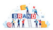 © James - Diverse team of professionals works together to build a strong company brand using colorful letter blocks and strategic planning.