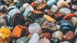 © PinkiePie - Tumbled stones pile macro, assorted colorful polished pebbles (jasper, agate, quartz) mixed together