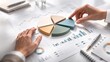 © Alina - Investment portfolio pie chart model. Asset allocation analysis on report. Financial planning documents in light colors. Portfolio diversification strategy concept. Stock market performance charts.